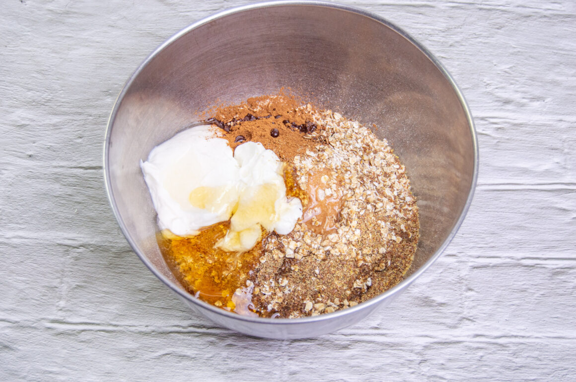 adding ingredients to the bowl