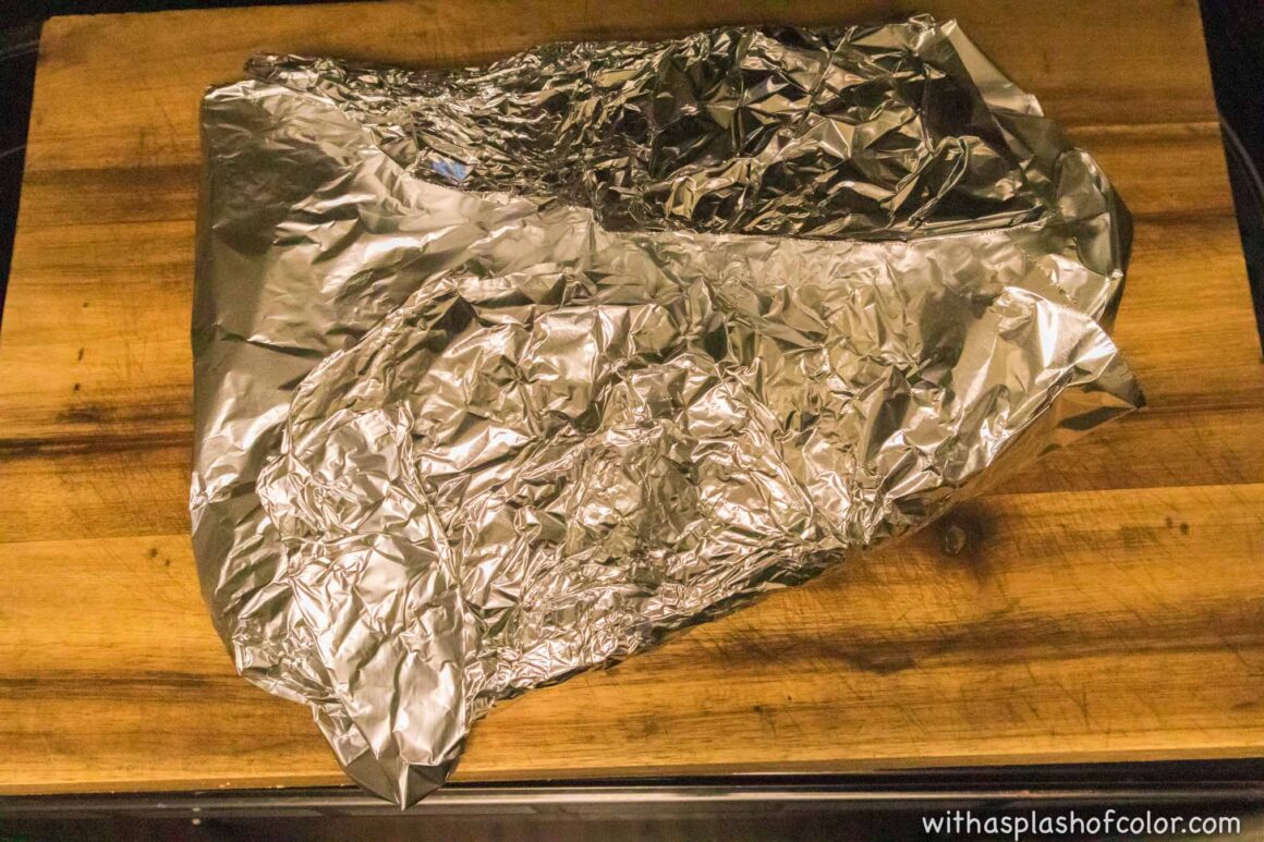 letting the brisket rest in aluminum foil 