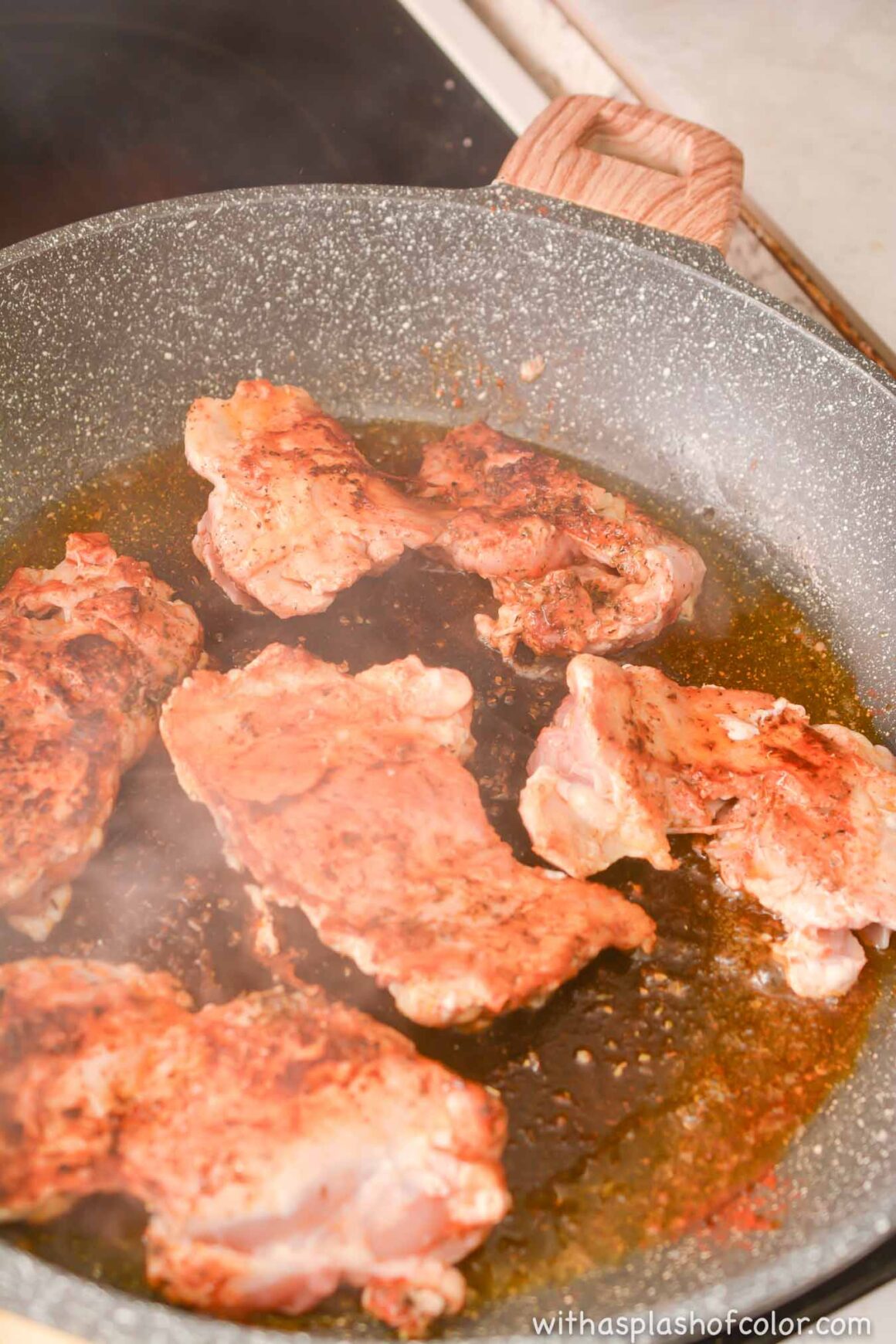 cooking chicken in the skillet 