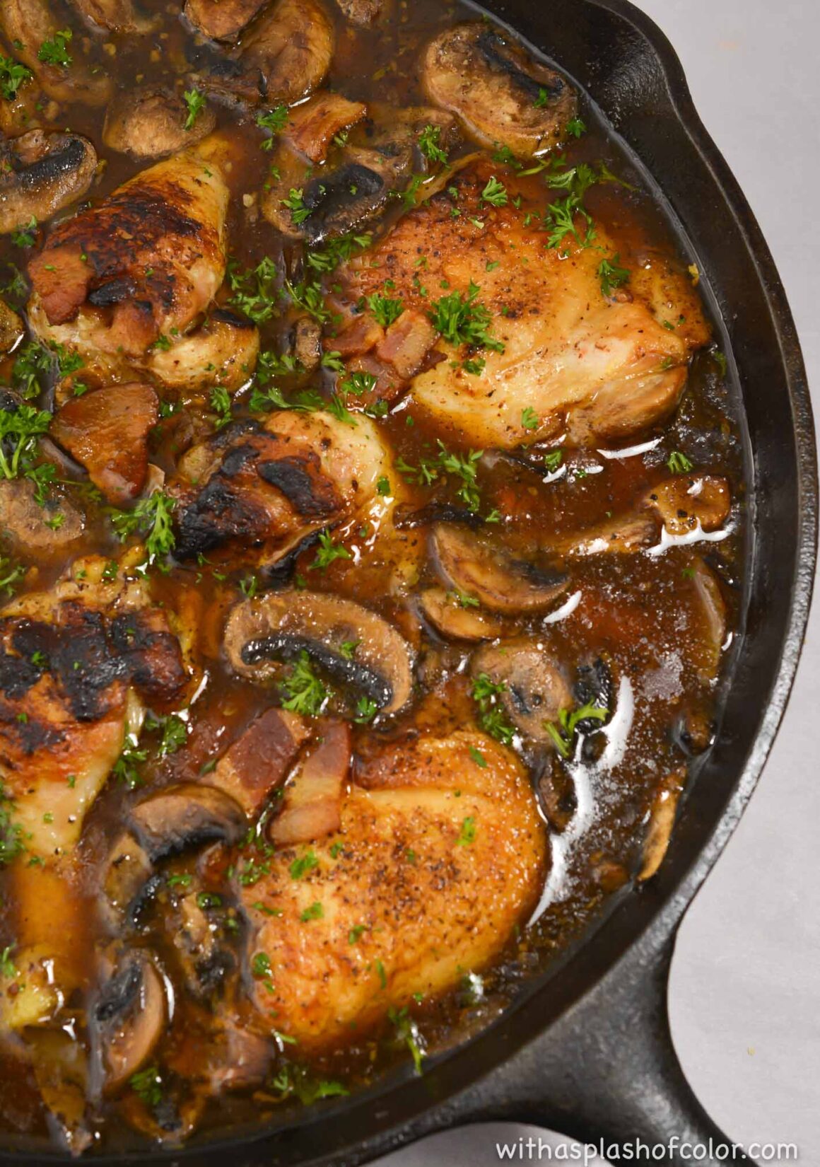 adding the chicken into the skillet
