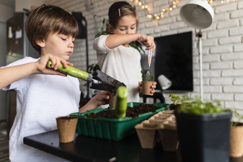 Start An Indoor Herb Garden | Children helping to start an indoor herb garden.